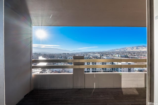 balcony featuring a mountain view