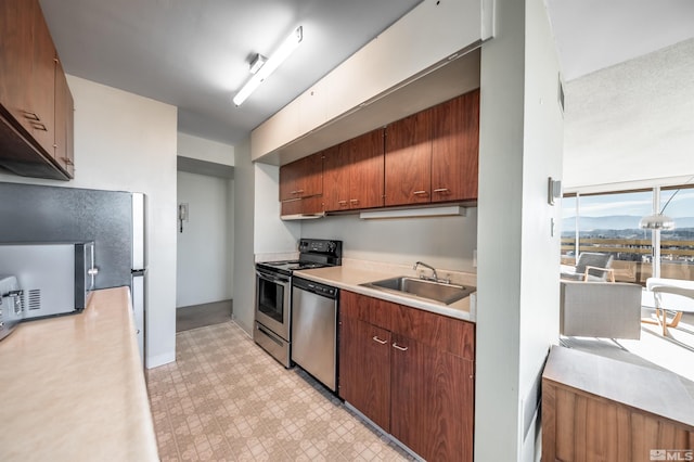 kitchen with sink and stainless steel appliances