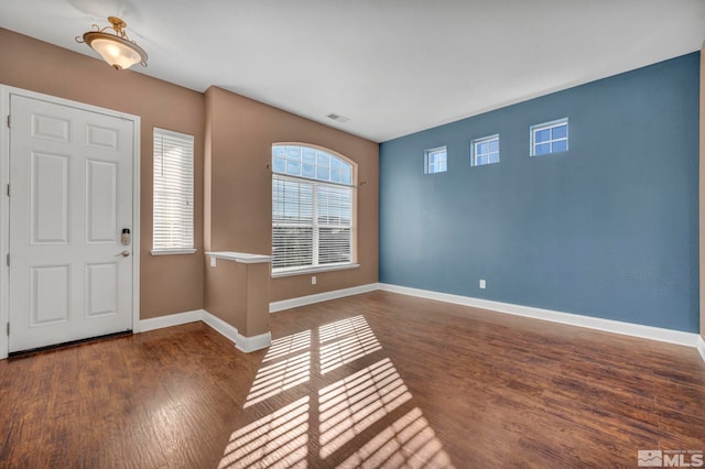 foyer featuring dark hardwood / wood-style floors