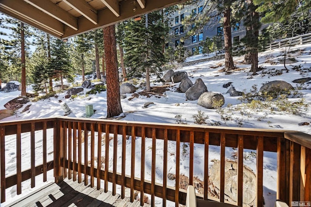 view of snow covered deck