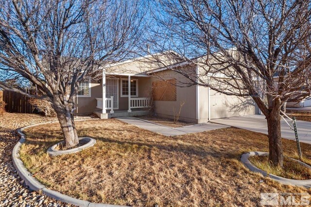 single story home featuring a garage