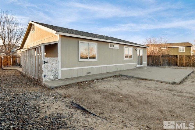 rear view of property with a patio area