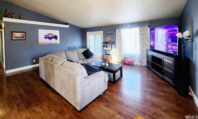 living room with lofted ceiling and dark hardwood / wood-style floors