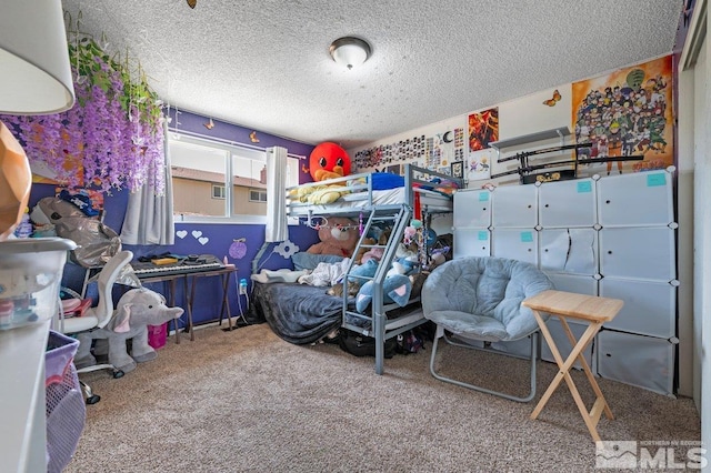 carpeted bedroom featuring a textured ceiling