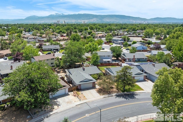 drone / aerial view featuring a mountain view