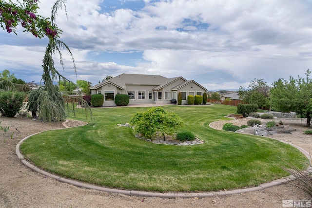 view of front of home with a front yard