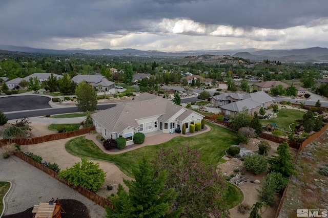 drone / aerial view featuring a mountain view