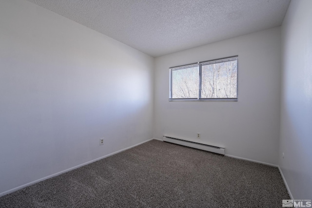 empty room featuring a textured ceiling, a baseboard radiator, and dark carpet