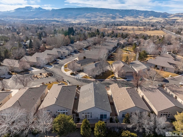 drone / aerial view featuring a mountain view