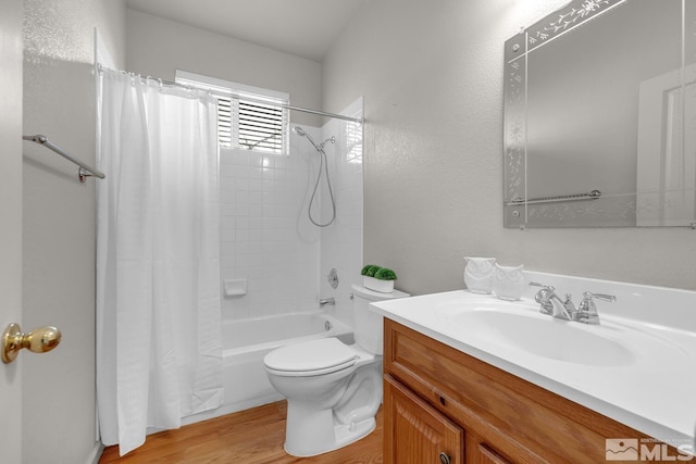 full bathroom featuring toilet, vanity, shower / bath combination with curtain, and hardwood / wood-style floors