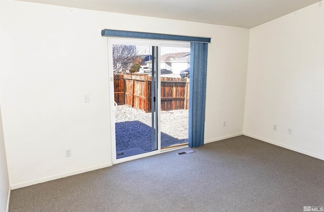 unfurnished room with carpet