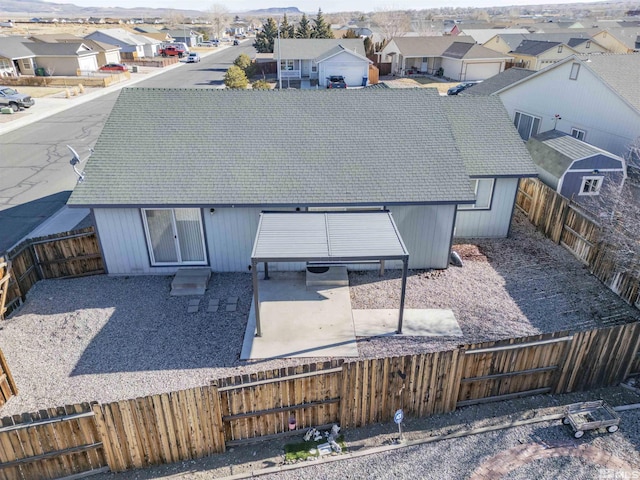 rear view of property featuring a patio