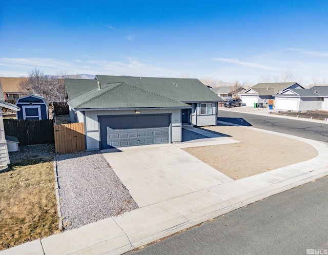 ranch-style house featuring a garage