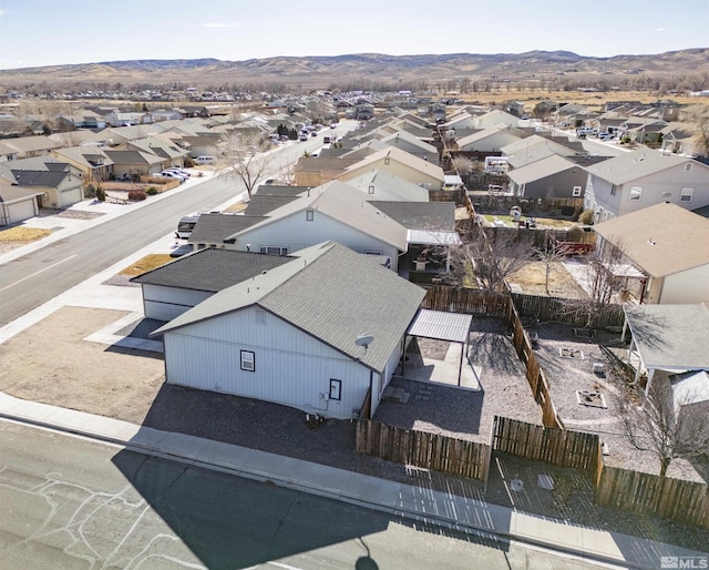 birds eye view of property with a mountain view