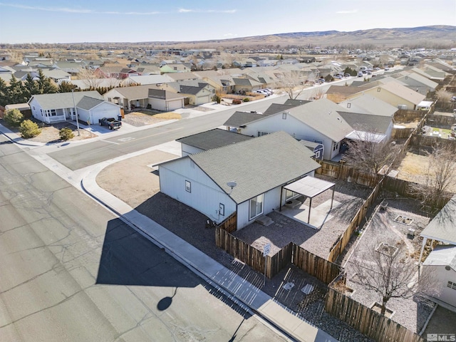 drone / aerial view featuring a mountain view