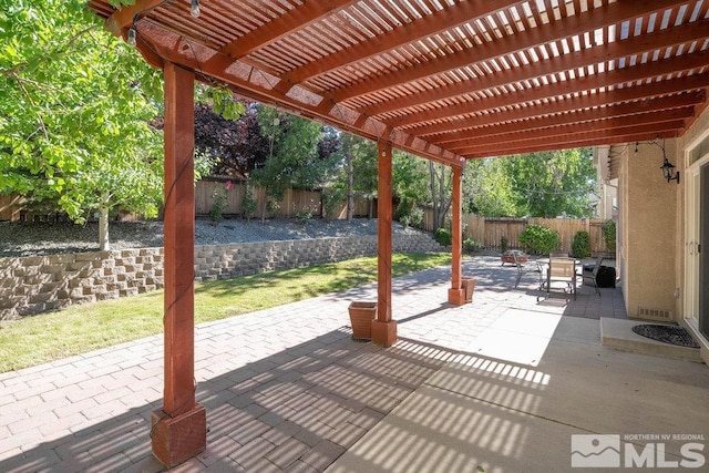 view of patio / terrace featuring a pergola