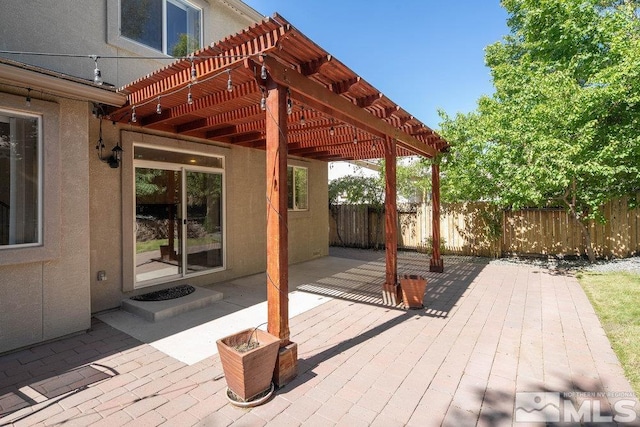 view of patio / terrace featuring a pergola