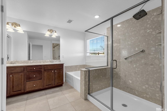 bathroom with vanity, tile patterned floors, a chandelier, and independent shower and bath