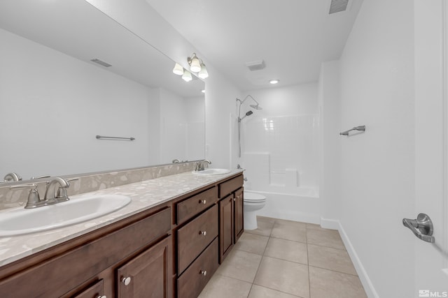 full bathroom with shower / tub combination, vanity, tile patterned floors, and toilet