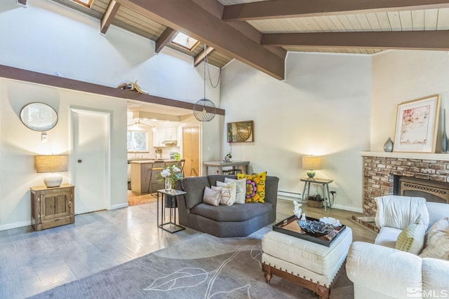 living room with light hardwood / wood-style floors, a fireplace, a baseboard radiator, wooden ceiling, and vaulted ceiling with beams