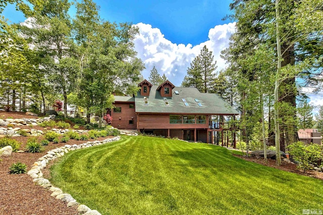 view of yard featuring a deck