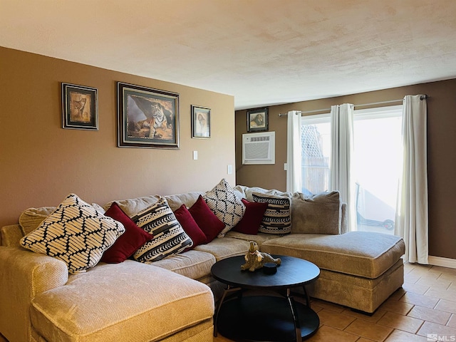 tiled living room with a wall mounted air conditioner