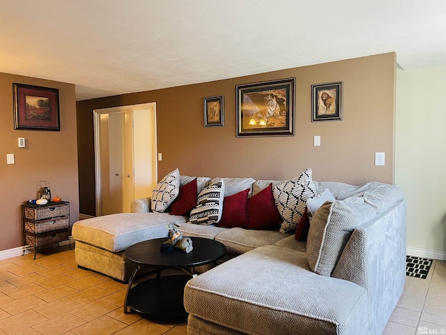 living room with light tile patterned floors