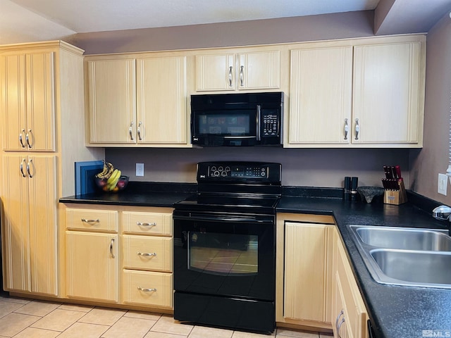 kitchen with sink, light brown cabinets, light tile patterned flooring, and black appliances