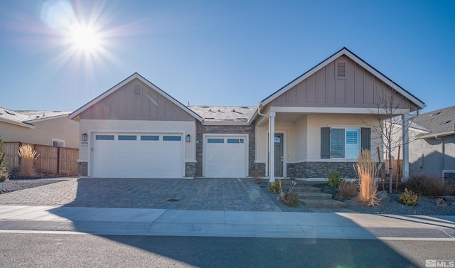 view of front of property featuring a garage