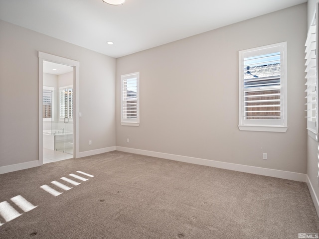 view of carpeted spare room