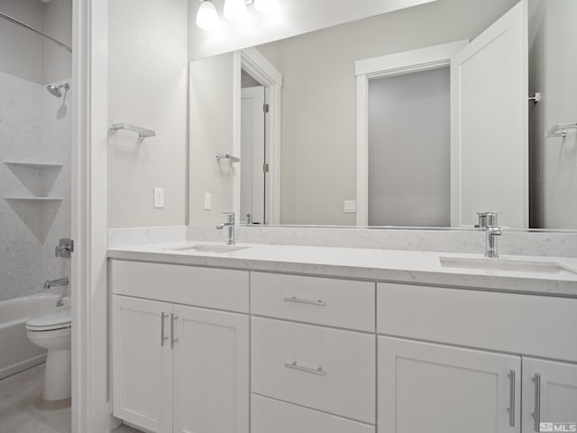 full bathroom with toilet, vanity, and shower / bath combination