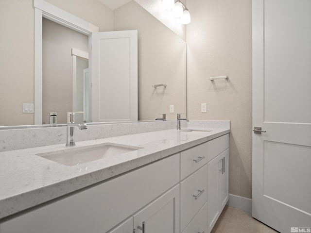 bathroom featuring vanity and tile patterned flooring