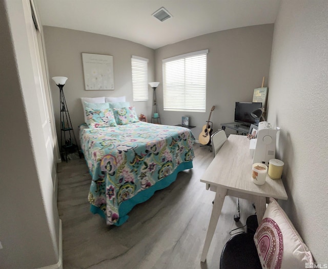 bedroom featuring hardwood / wood-style flooring