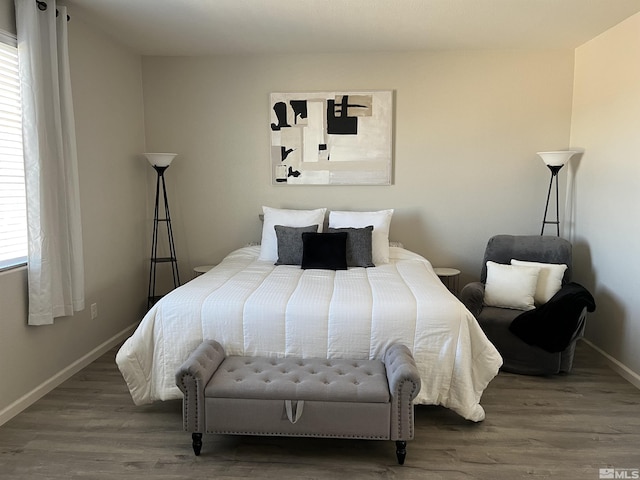 bedroom featuring hardwood / wood-style floors