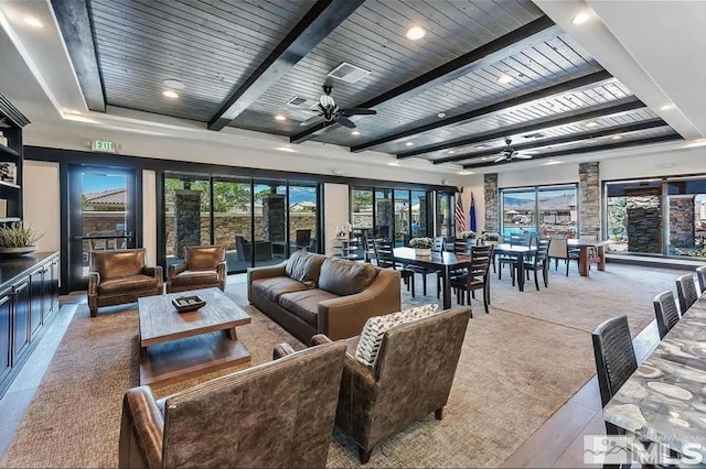 tiled living room featuring wooden ceiling, ceiling fan, and beam ceiling