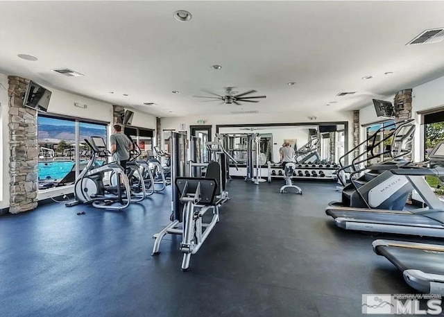 exercise room featuring ceiling fan