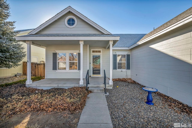 property entrance with covered porch