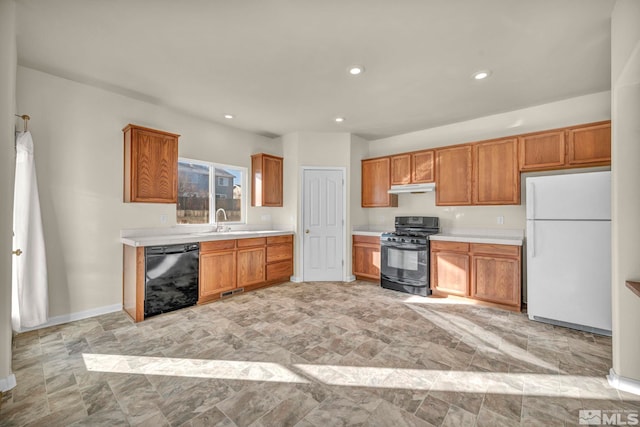 kitchen with black appliances and sink