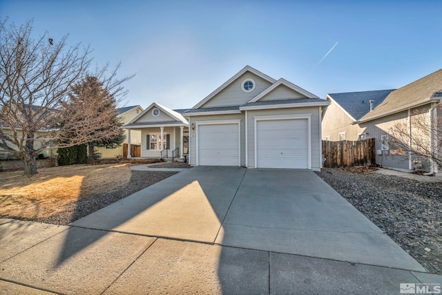 view of front of property with a garage and a porch