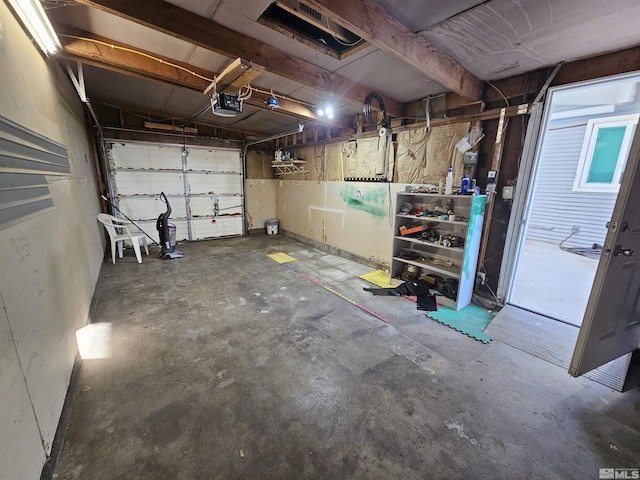 garage featuring a garage door opener