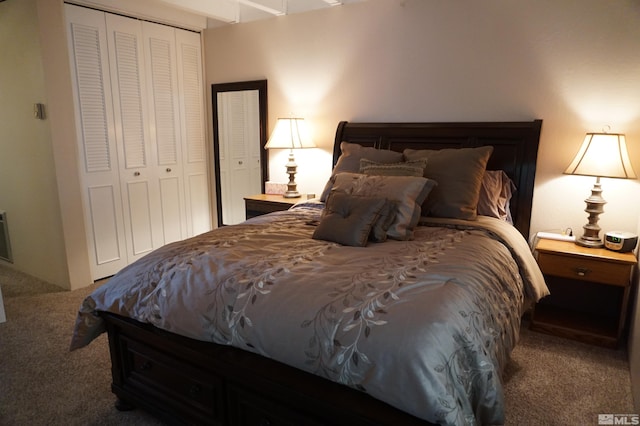 bedroom featuring a closet and carpet flooring