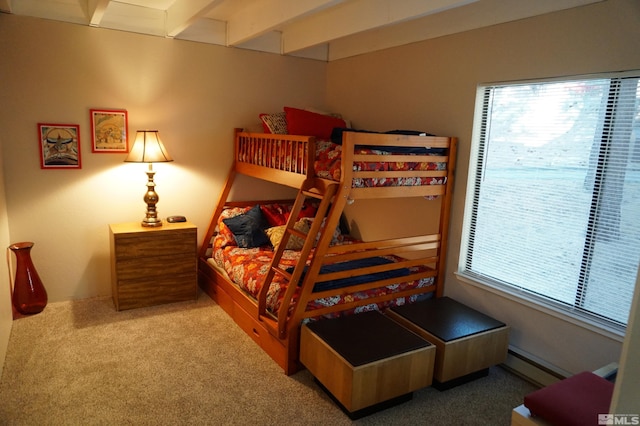 bedroom featuring a baseboard radiator and carpet