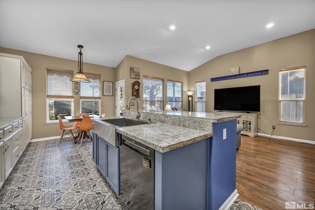 kitchen featuring sink, white cabinetry, dishwasher, an island with sink, and hanging light fixtures