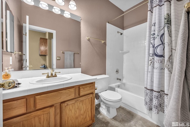 full bathroom with toilet, vanity, tile patterned flooring, and shower / bathtub combination with curtain