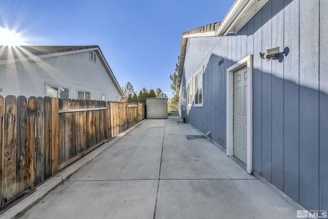 view of property exterior featuring a patio area