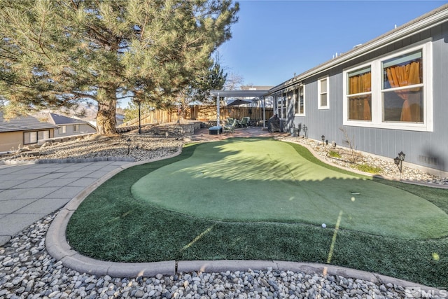 view of yard with a patio area and a pergola