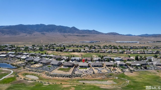 drone / aerial view featuring a mountain view