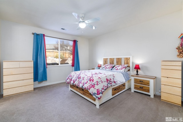 bedroom featuring ceiling fan and carpet floors