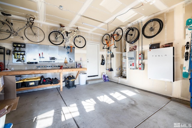 garage with a workshop area