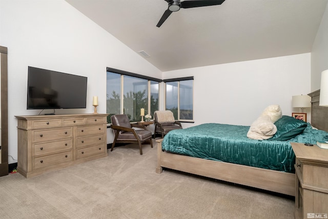 carpeted bedroom with high vaulted ceiling and ceiling fan